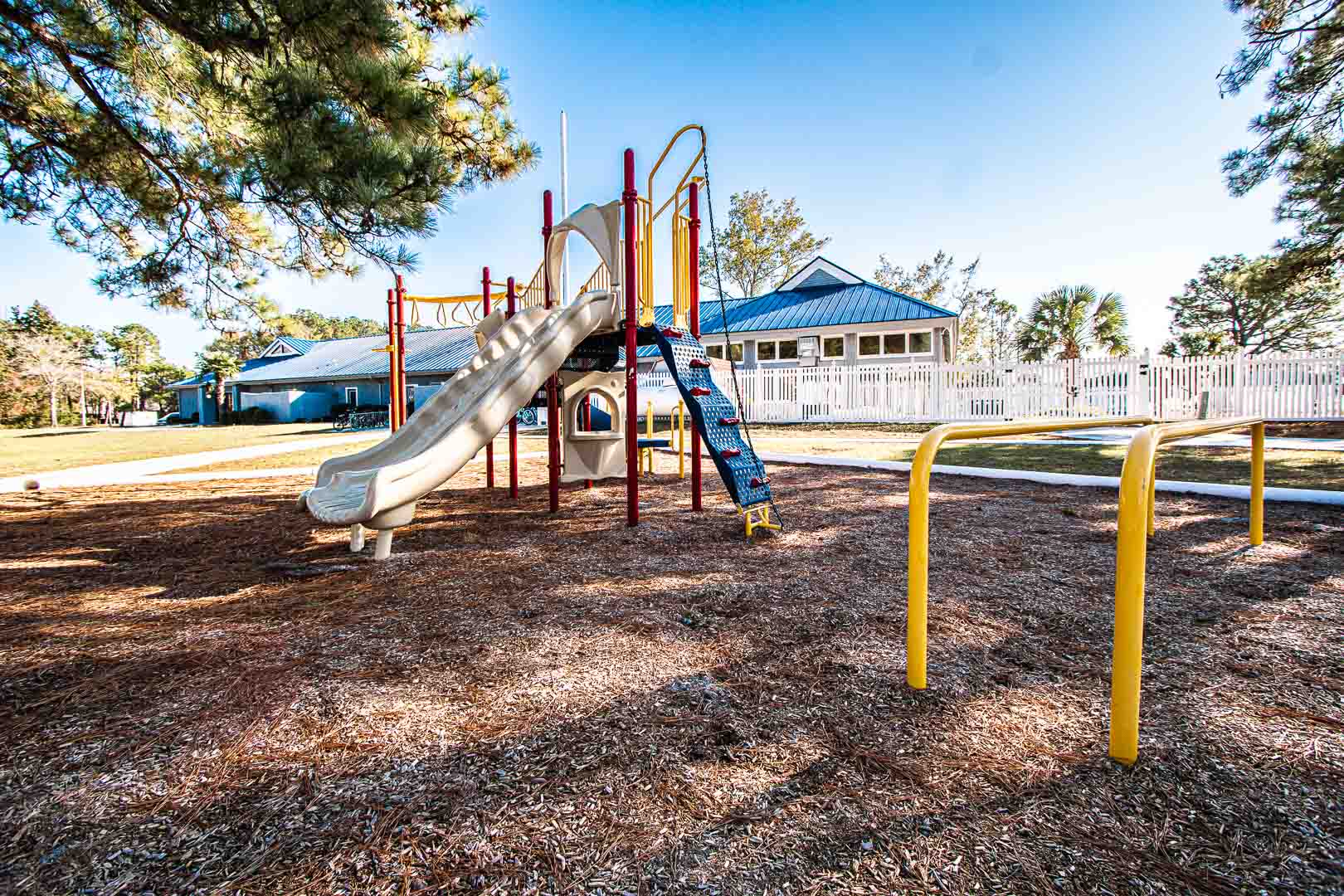 A colorful outdoor children's playground at VRI's Waterwood Townhomes in New Bern, North Carolina.